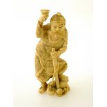 CARVED IVORY MAN WITH SWORD H: 5.5”