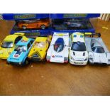4 BOXED SCALEXTRIC CARS INCLUDING AUDI, MINI AND LAMBORGHINI AND 6 LOOSE SCALEXTRIC CARS
