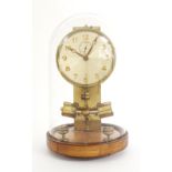 Ato electric mantel clock, the 4.25" silvered dial supported upon a brass stand and circular