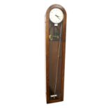 Smiths English Clock Systems electric master clock, the 6.25" white dial within a rounded arched oak