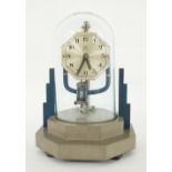 Electric Bulle mantel clock, the 3.5" octagonal silvered dial under a glass dome and upon an Art