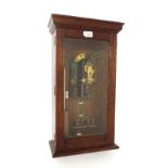 Gent of Leicester G.P.O. type 46 electric master clock, within a dark stained oak stepped glazed