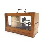 Old German barograph, within a light wooden case mounted with a plaque inscribed with an eagle and