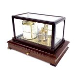 Mahogany barograph, within a bevelled glazed case over a canted plinth fitted with a chart drawer,
