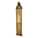 Admiral Fitzroy barometer, within a Gothic carved oak glazed case, 46" high