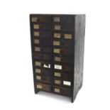 Wooden twenty drawer chest containing a quantity of mostly pocket watch glasses, chest 23'' high