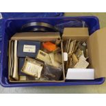 Box containing a quantity of watchmakers' parts to include mainsprings etc, also clock winders and