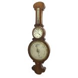 Walnut banjo clock/barometer with thermometer, the 10" silvered barometer dial within a shaped
