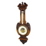 Mahogany aneroid barometer/thermometer, the 7.5" white enamel chapter ring enclosing a