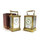 French repeater carriage clock striking on a gong, within a corniche style gilded brass case with