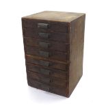 Wooden eight drawer chest containing a quantity of pocket watch glasses, chest 17'' high