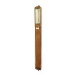 Oak stick barometer, the ivory scale signed T.B. Winter & Son, Newcastle on Tyne, 37" high