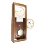 Siemens electric master clock with internal programmer and slave dial, the 9.5" silvered dial with