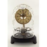 Electric Bulle patent clock, the 5" silvered dial with skeletonised centre, under a glass dome