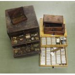 Small chest containing various old small clock parts etc; also two drawers of various size