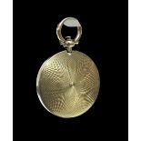19th century circular gold engine turned mourning locket pendant, inset with a lock of hair, 6.