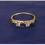 18ct sapphire and diamond five stone ring in a yellow claw setting, ring size M