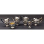 Fine Victorian six piece silver tea service comprising teapot, coffee pot, two water jugs, milk