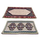 Two Kelim rugs, 77" x 41" and 77" x 42" respectively (2)