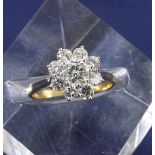 18ct diamond cluster ring, round brilliant-cut, the centre stone 0.50ct, clarity SI1, colour I-J, in