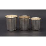 Three hallmarked French silver beakers, the largest 3.5", the smallest 2.75", 7oz approx (3)