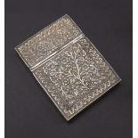 Eastern white metal card case embossed with flowers and scrolled foliage, 4" high, 3.5oz approx