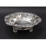 Good 1930s cast silver comport, the rim cast with trailing grapes over pierced scroll vine, maker