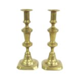 Pair of 19th century brass candlesticks with 'Push Rod' ejector, 10" high, 3.75" wide