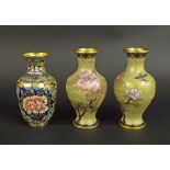 Pair of Japanese cloisonne baluster vases, decorated with birds and floral sprays upon a yellow