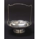 Mappin & Webb 1930s silver basket the stylised handle with shaped diaper piercing upon a piecrust