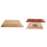 Persian Bokhara type floor rug, 79" x 55"; together with a Persian runner and two other rugs