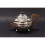 George III silver boat shaped teapot engraved with Greek key banding, acanthus and swags upon ball