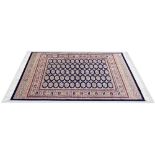 Bokhara rug with blue ground, 75'' x 55''