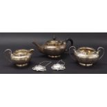 1920s silver three piece bachelor tea service of squat ovoid form, maker F & P, London 1921, the