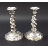 Pair of Continental white metal barley twist candlesticks, marked with a crowned P within a wreath