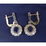 Pair of platinum sapphire and diamond drop cluster earrings, the sapphires 1.66ct approx in a