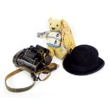 Pair of Busch cased binoculars, bowler hat, Chad Valley teddy bear and Dutch doll in clogs and an