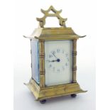 Miniature carriage clock timepiece bearing the Duverdrey & Bloquel trademark logo on the back plate,