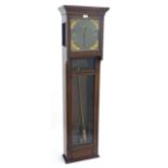 Mahogany cased electric trunk dial wall clock, the 10" dial with subsidiary seconds dial, over a