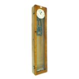 Synchronome electric master clock, the 6.25" silvered dial within a glazed oak case, 50" high (