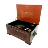 'The Imperial' table-top music box playing 9" discs, within a rosewood and inlaid crossbanded