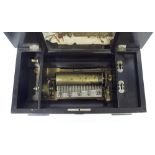 Faux rosewood cased music box playing on eight airs, with crank handle and 6" cylinder, within an