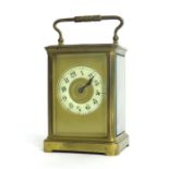 French carriage clock striking on a gong, the 2.5" cream chapter ring within a gilt mask and