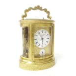 Good oval repeater alarm carriage clock striking on a bell, the 2" white dial signed Nicolo