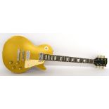 Early 1970s Gibson Les Paul Deluxe electric guitar, made in USA, ser. no. 6xxxx1, gold top finish