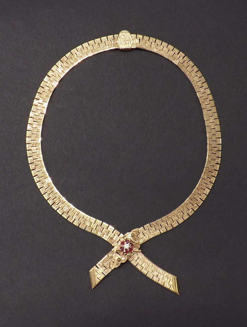 9ct necklace set with a diamond and ruby cluster, 56.1gm - Image 2 of 2
