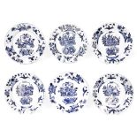 Set of six Chinese blue and white porcelain plates, decorated with vases and displays of flowers