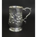 George III silver repousse tankard of bulbous form, maker 'T.W' (Thomas Wallis I), London 1774, 5"