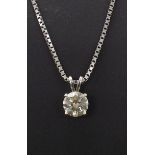 Single stone diamond pendant, 1.48ct approx, clarity SI1, colour tinted, with 18k chain, 14" long