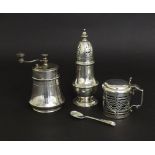 Cylindrical silver lidded mustard with blue glass liner and spoon, 2.25" high; silver baluster